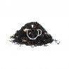 Détail noix de coco râpée et morceaux de fraise Thé Noir Fraise Coco